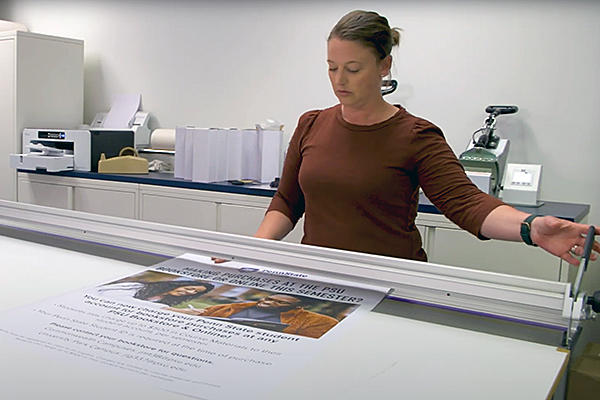 Employee using a printing machine