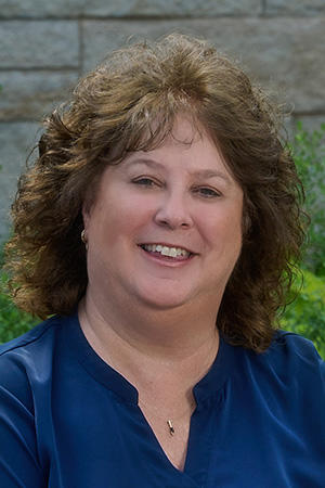 Portrait of Lori Rigg